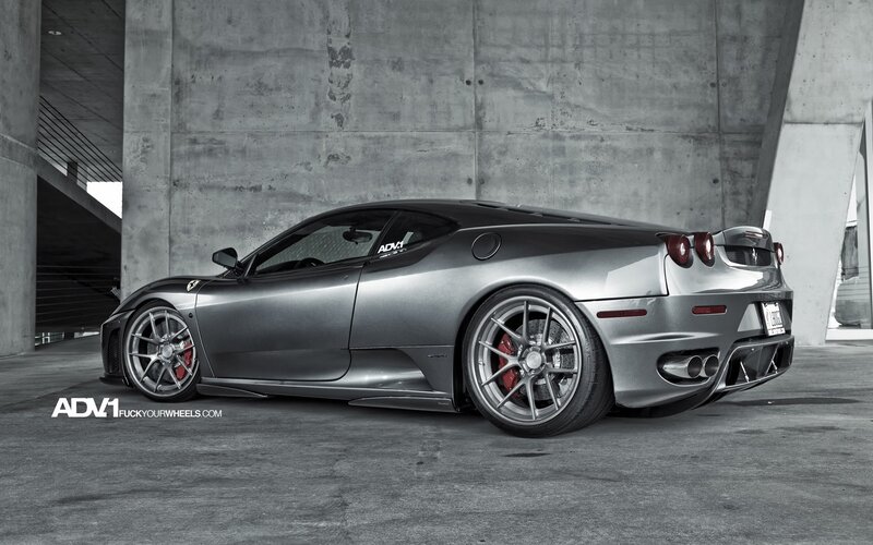 silver ferrari with custom wheels