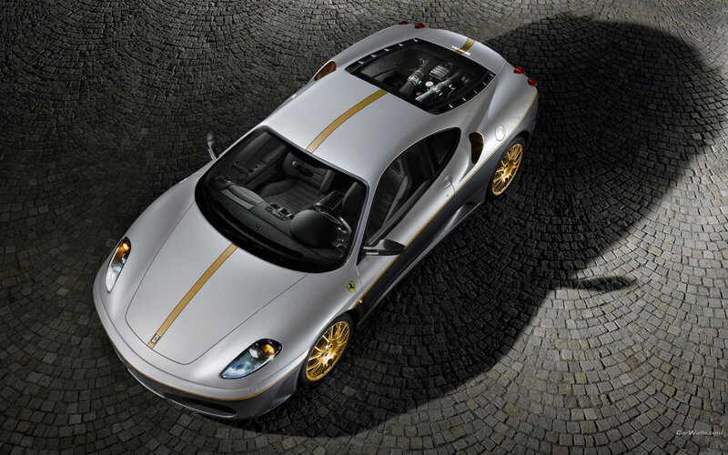 silver ferrari with gold accents