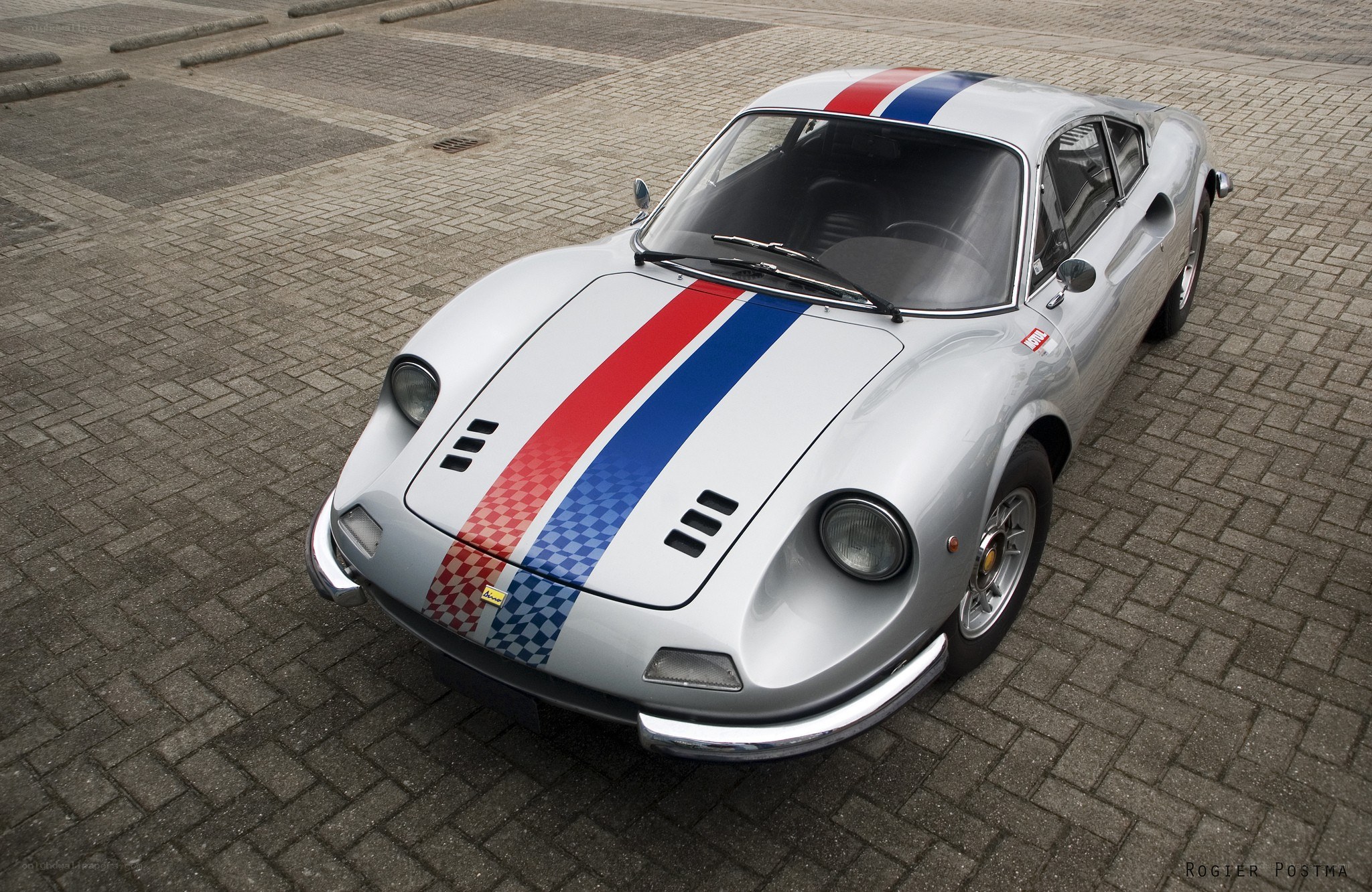 Silver Ferrari with racing stripes