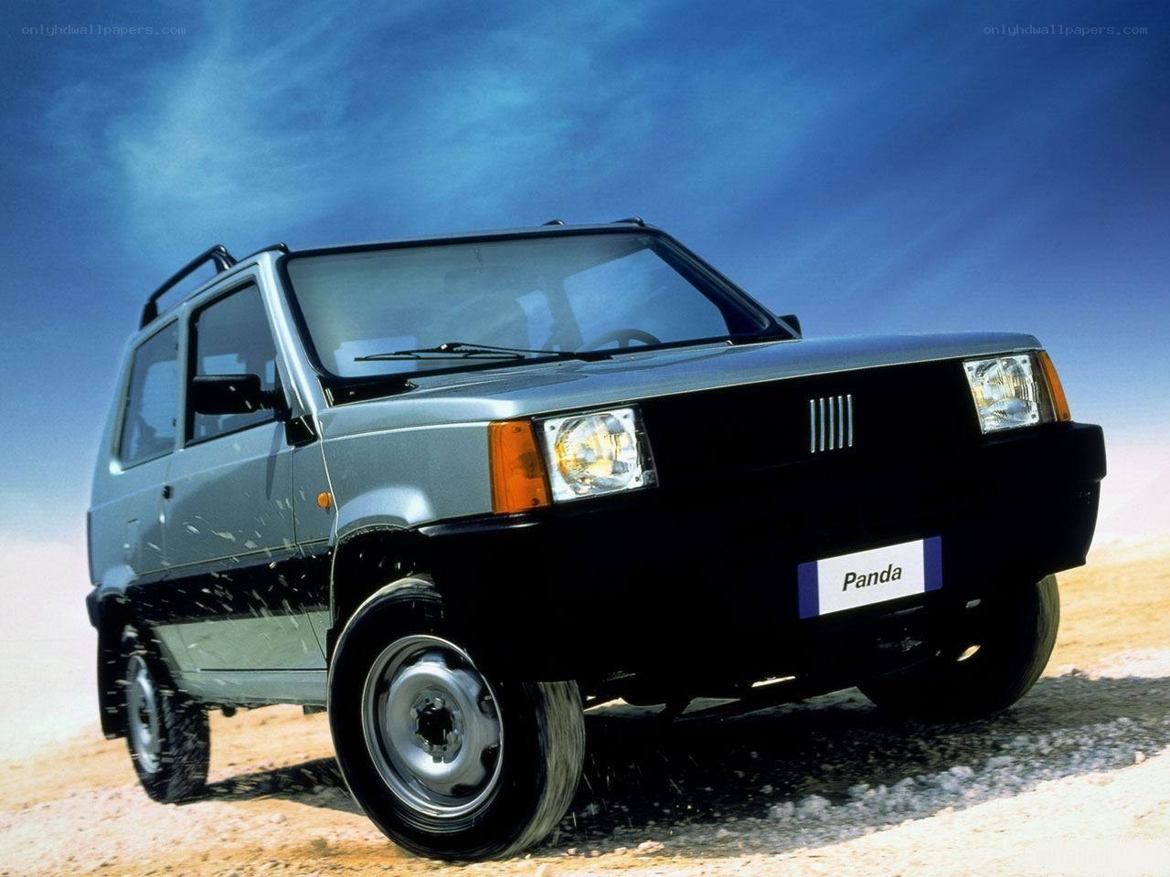 Silver Fiat Panda on desert terrain