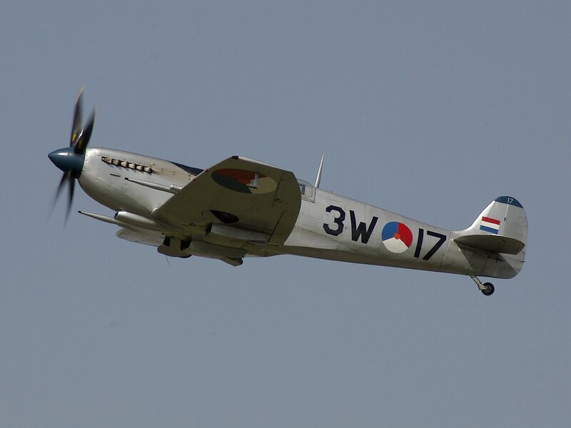 Silver Fighter Plane — Gray, Calm, Afternoon