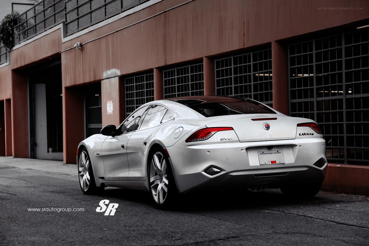 silver fisker karma parked