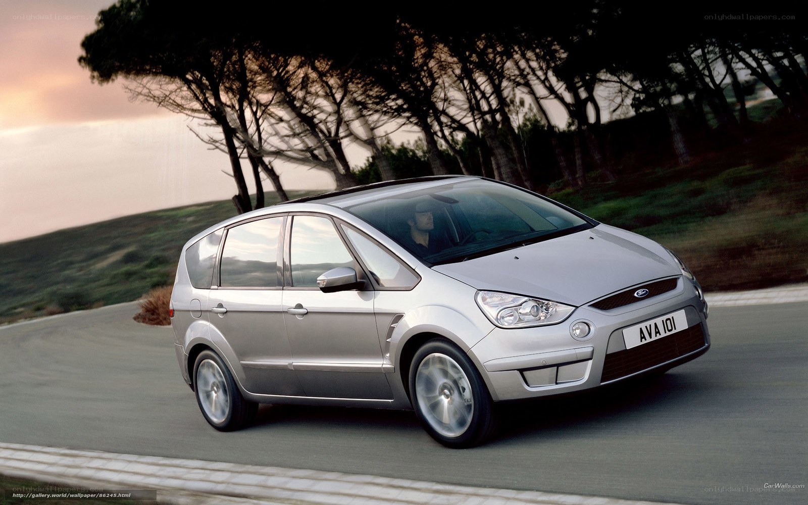 silver ford c-max driving on road