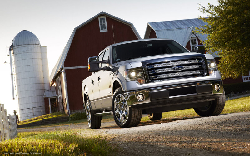 Silver Ford F-150 on farm road