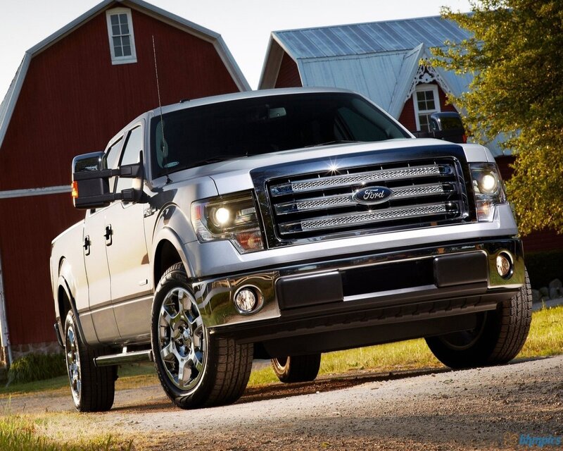 Silver Ford F-150 truck on farm