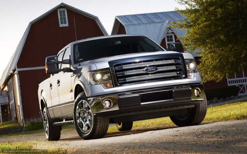 Silver Ford F-150 truck on farm