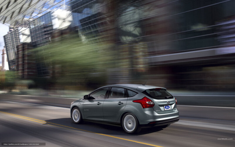 Silver Ford Focus in motion