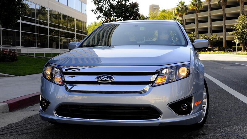silver ford fusion parked on street