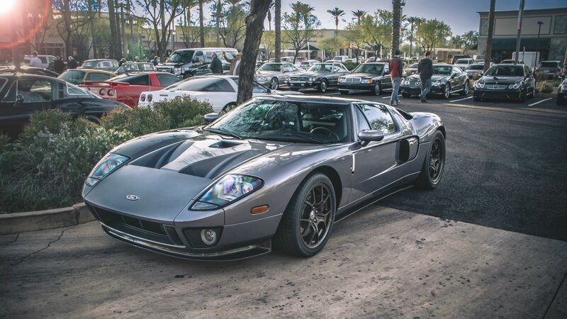 Silver Ford GT at a car show