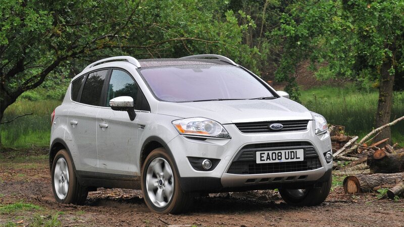 silver ford kuga in forest