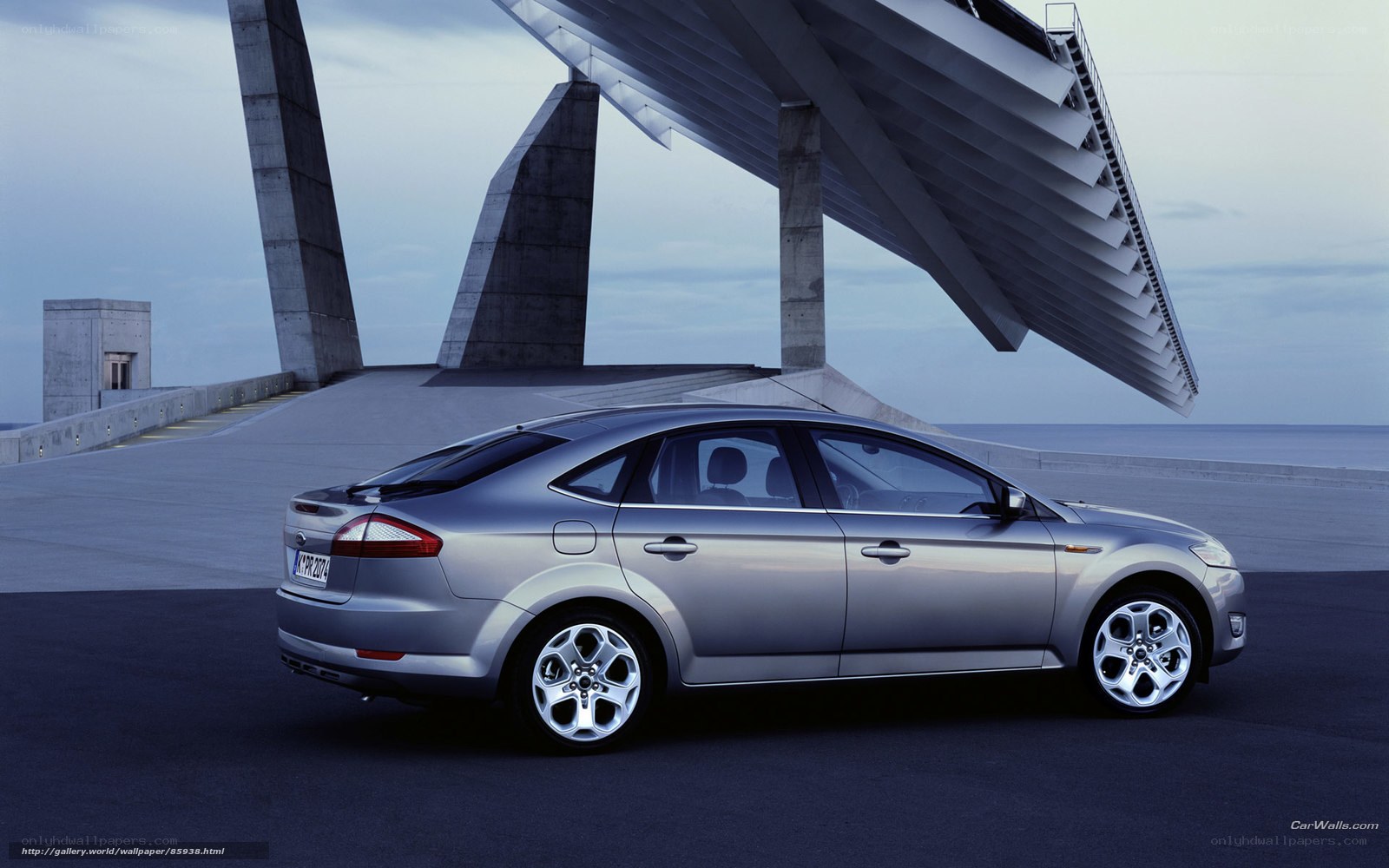 Silver Ford Mondeo by modern structure