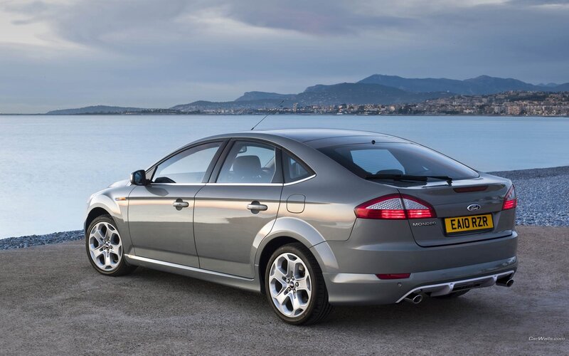 silver ford mondeo by the sea