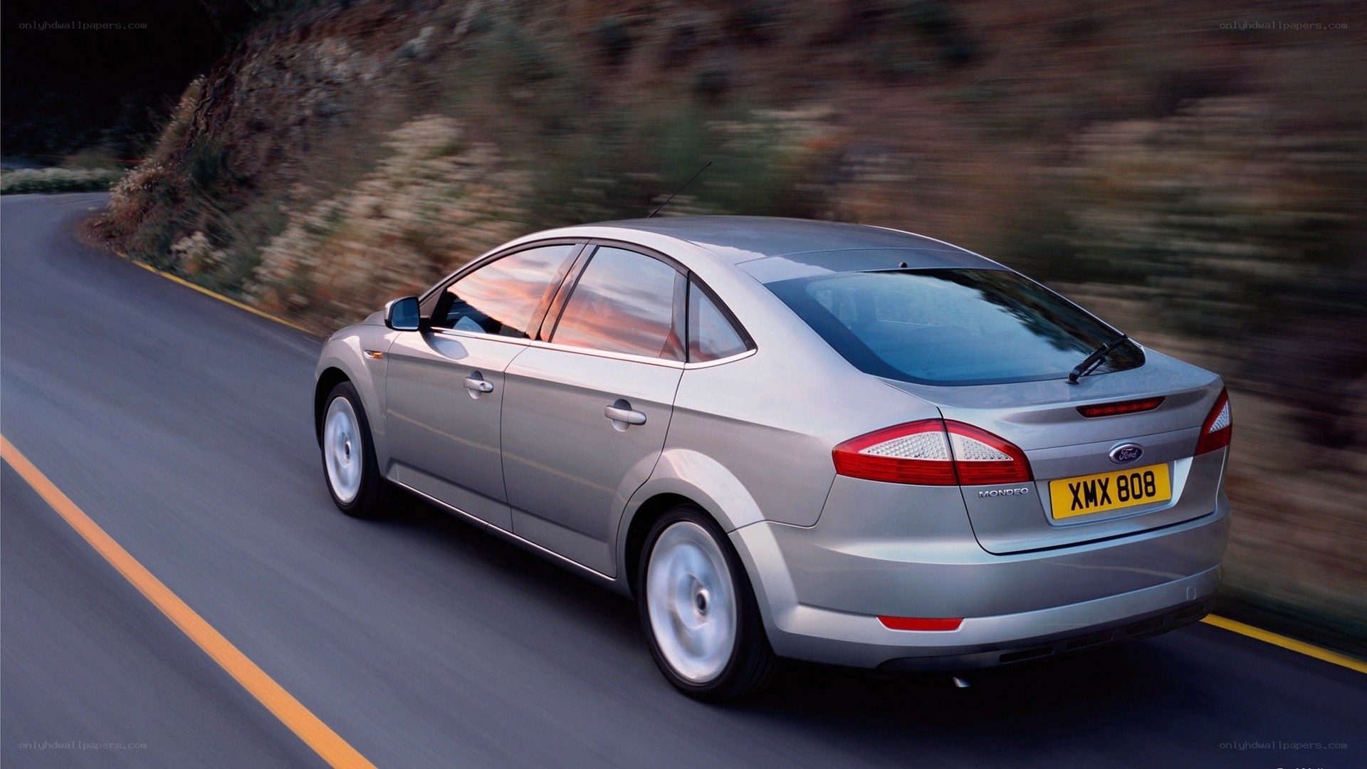 silver ford mondeo driving