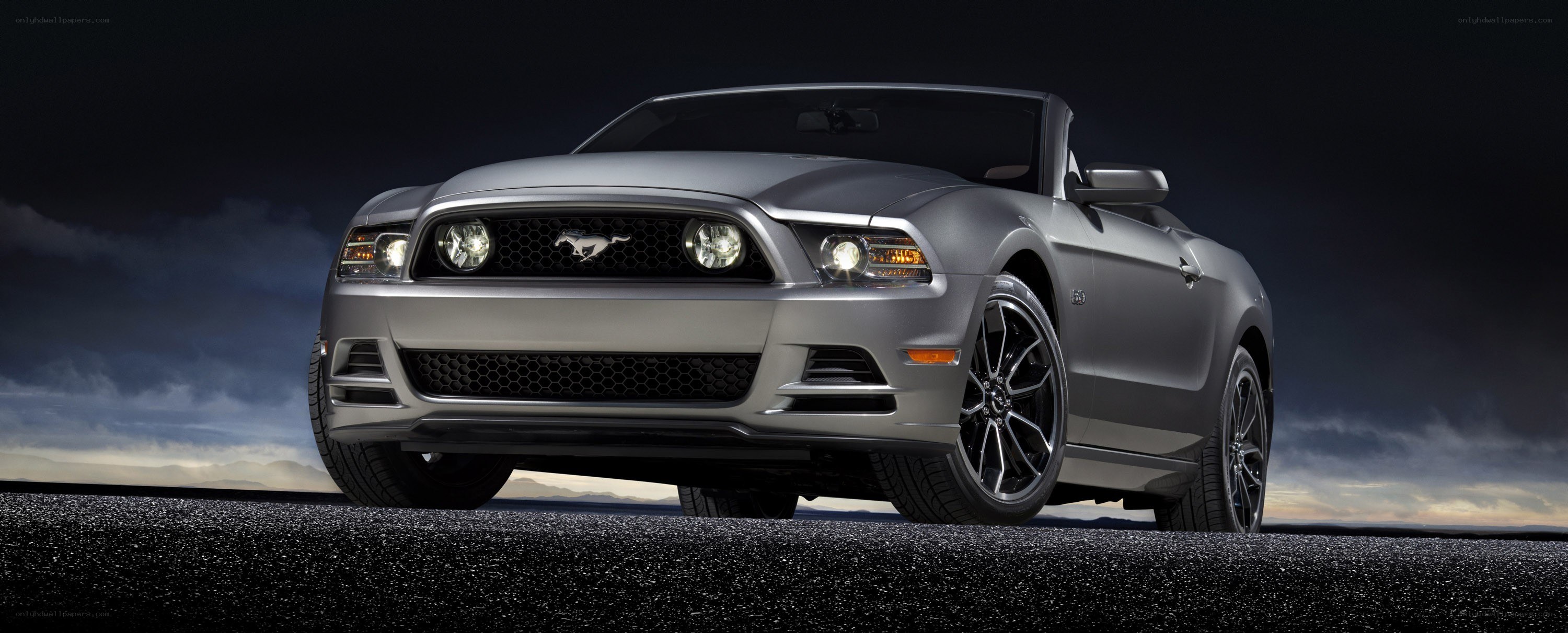 Silver Ford Mustang convertible