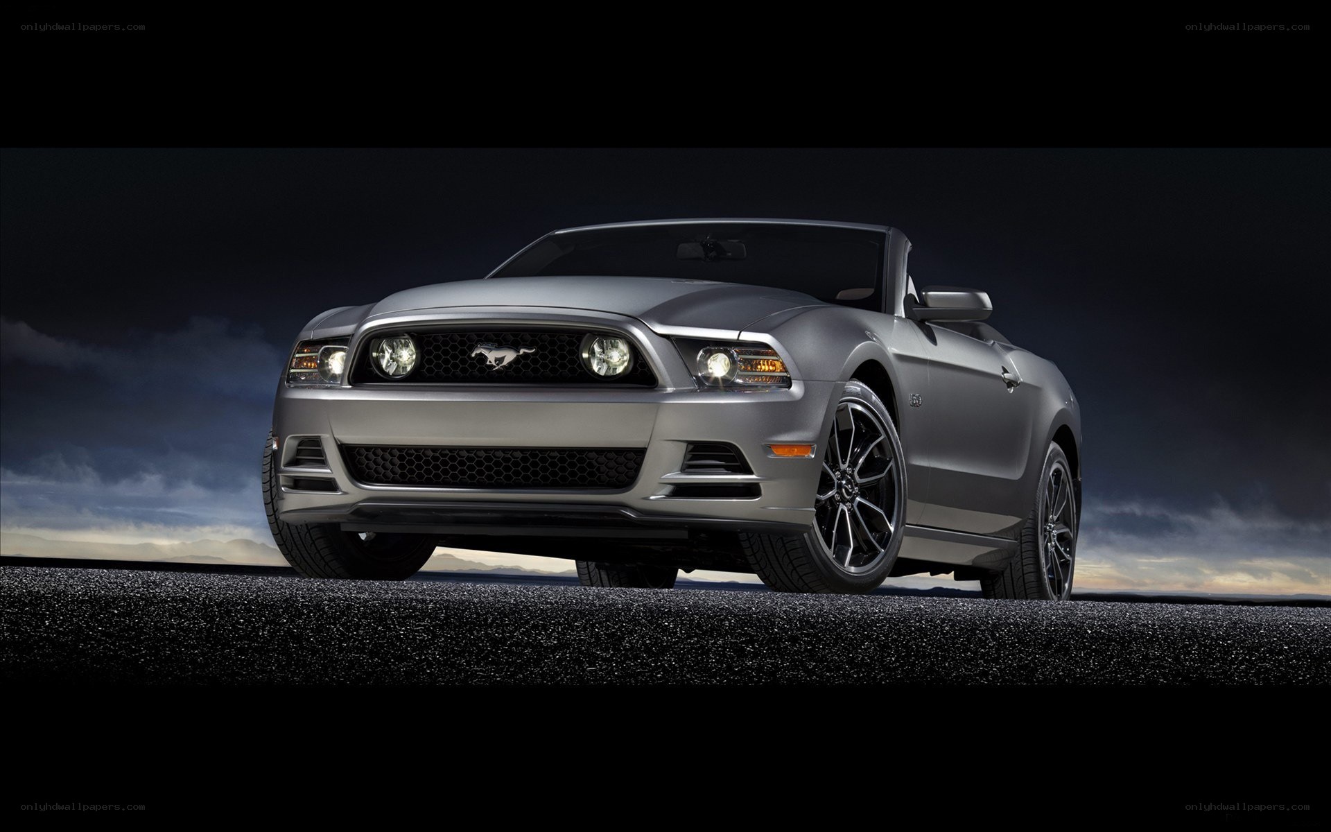 Silver Ford Mustang convertible