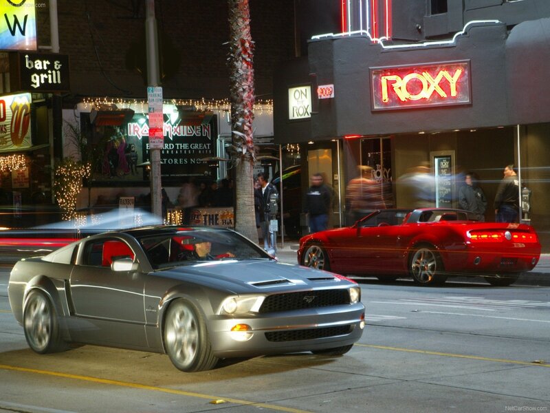Silver Ford Mustang on city street