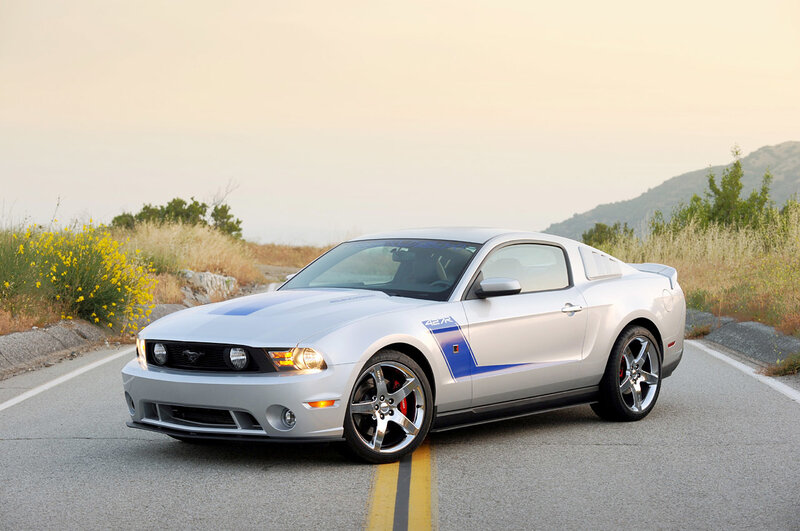 silver ford mustang on road