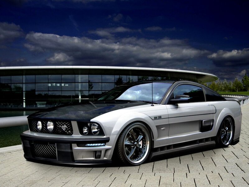 silver ford mustang with carbon fiber