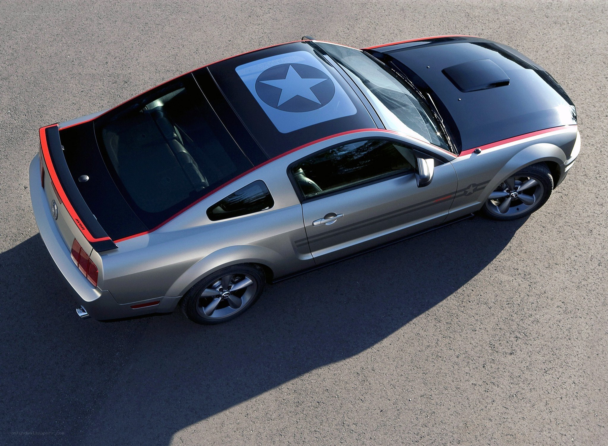 silver ford mustang with star decal