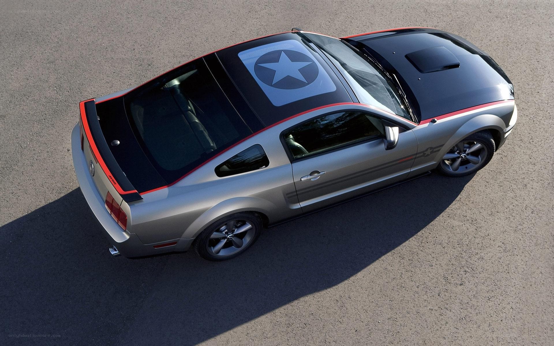 silver ford mustang with star decal