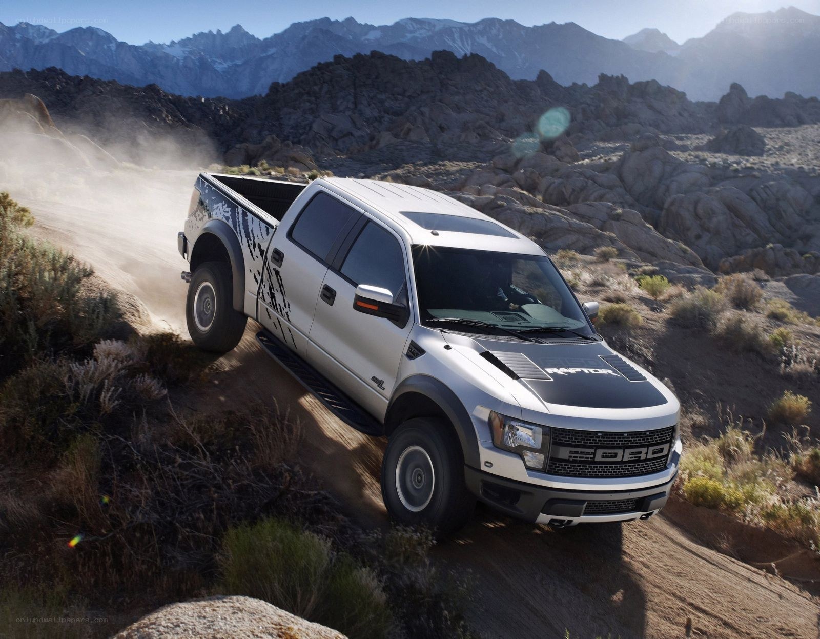 Silver Ford Raptor off-roading