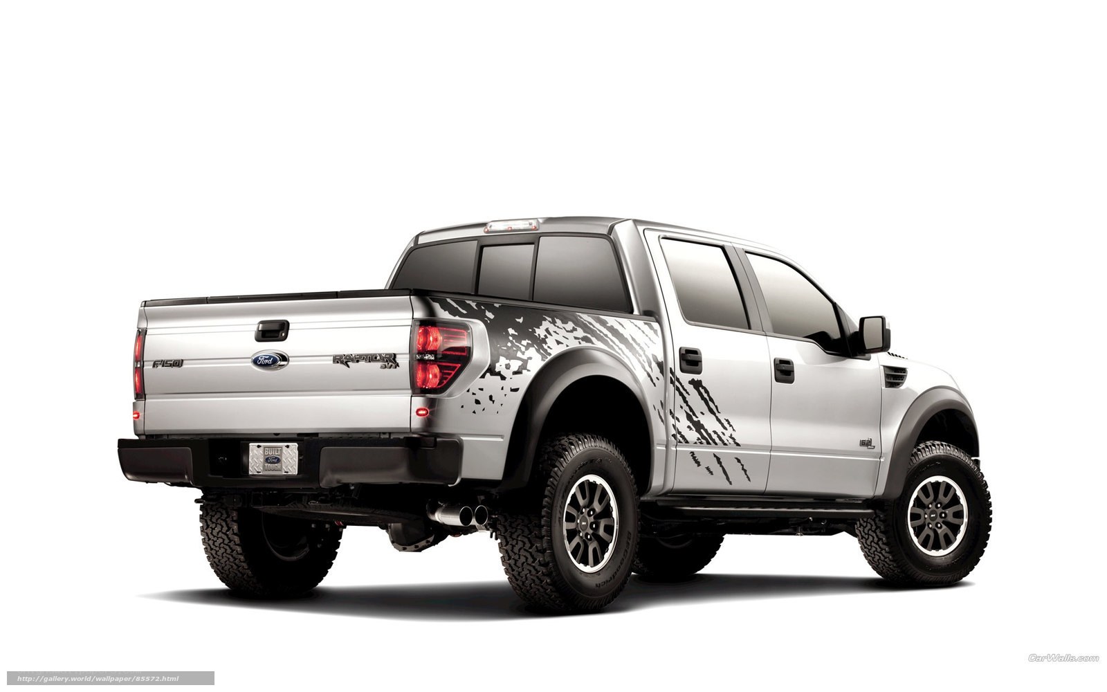 silver ford raptor pickup truck