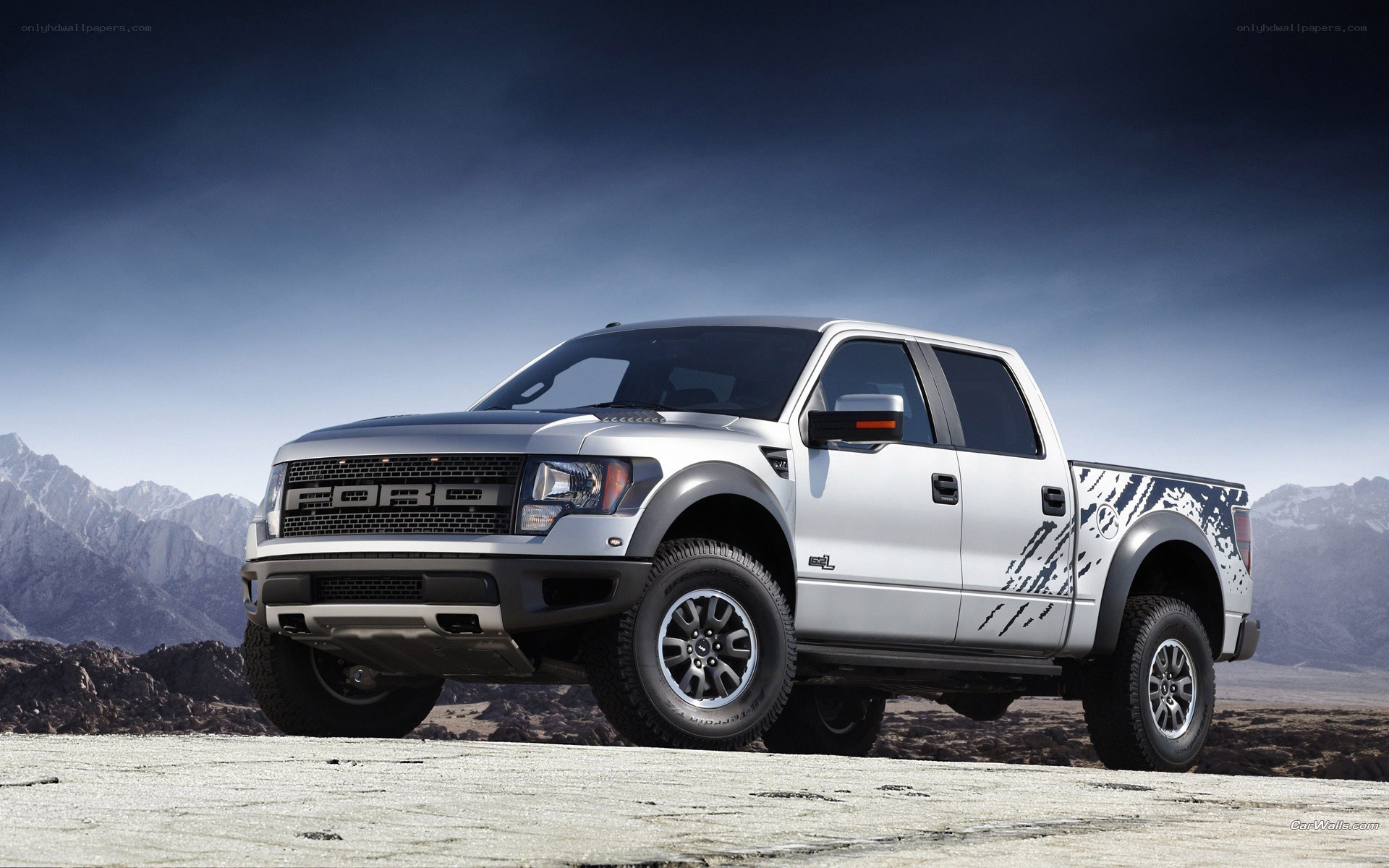 silver ford raptor truck