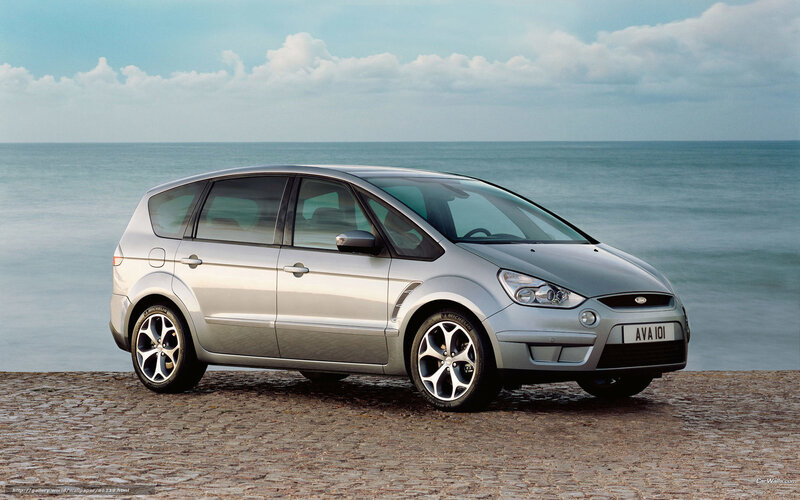 Silver Ford S-Max by the sea