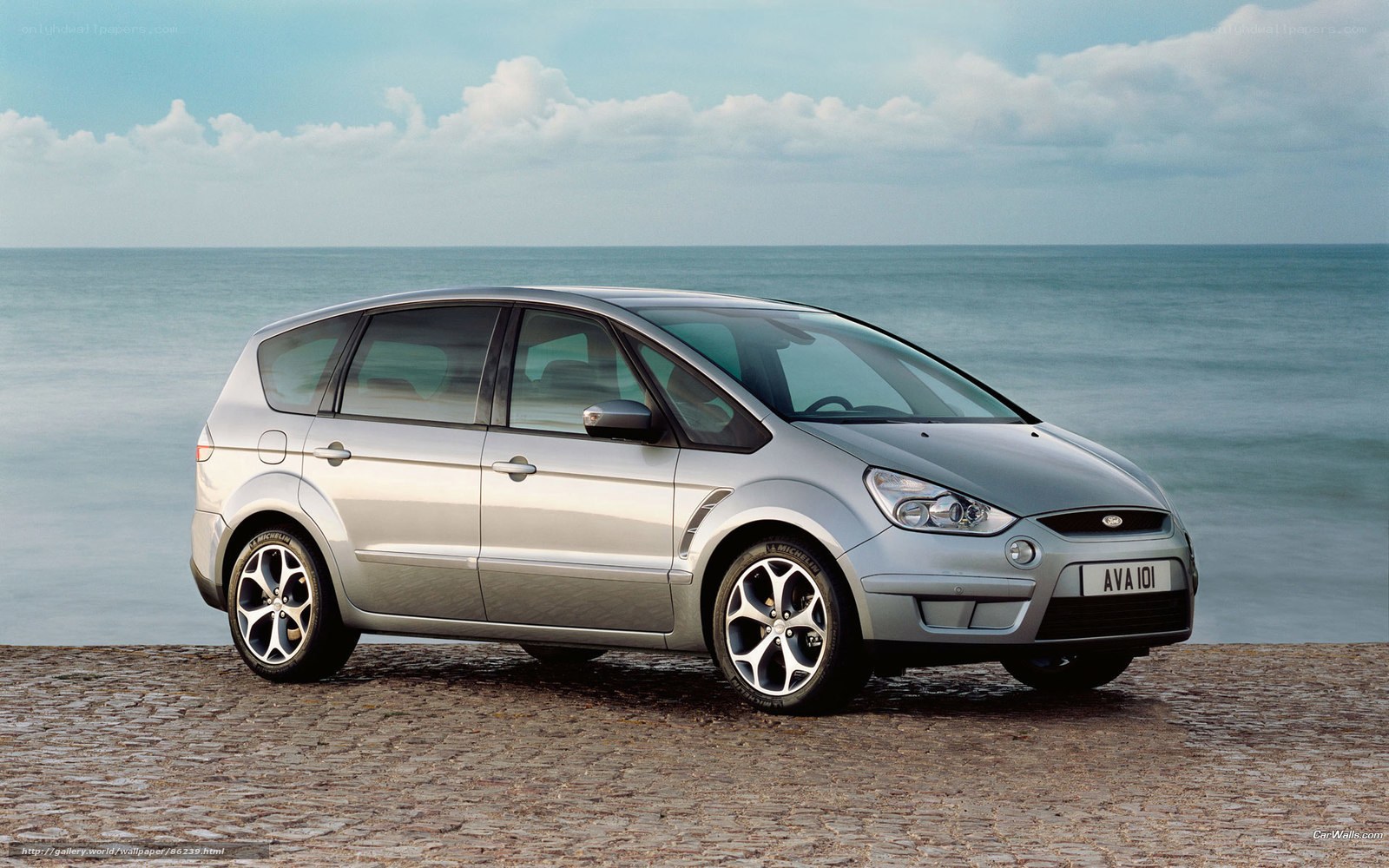 Silver Ford S-Max by the sea