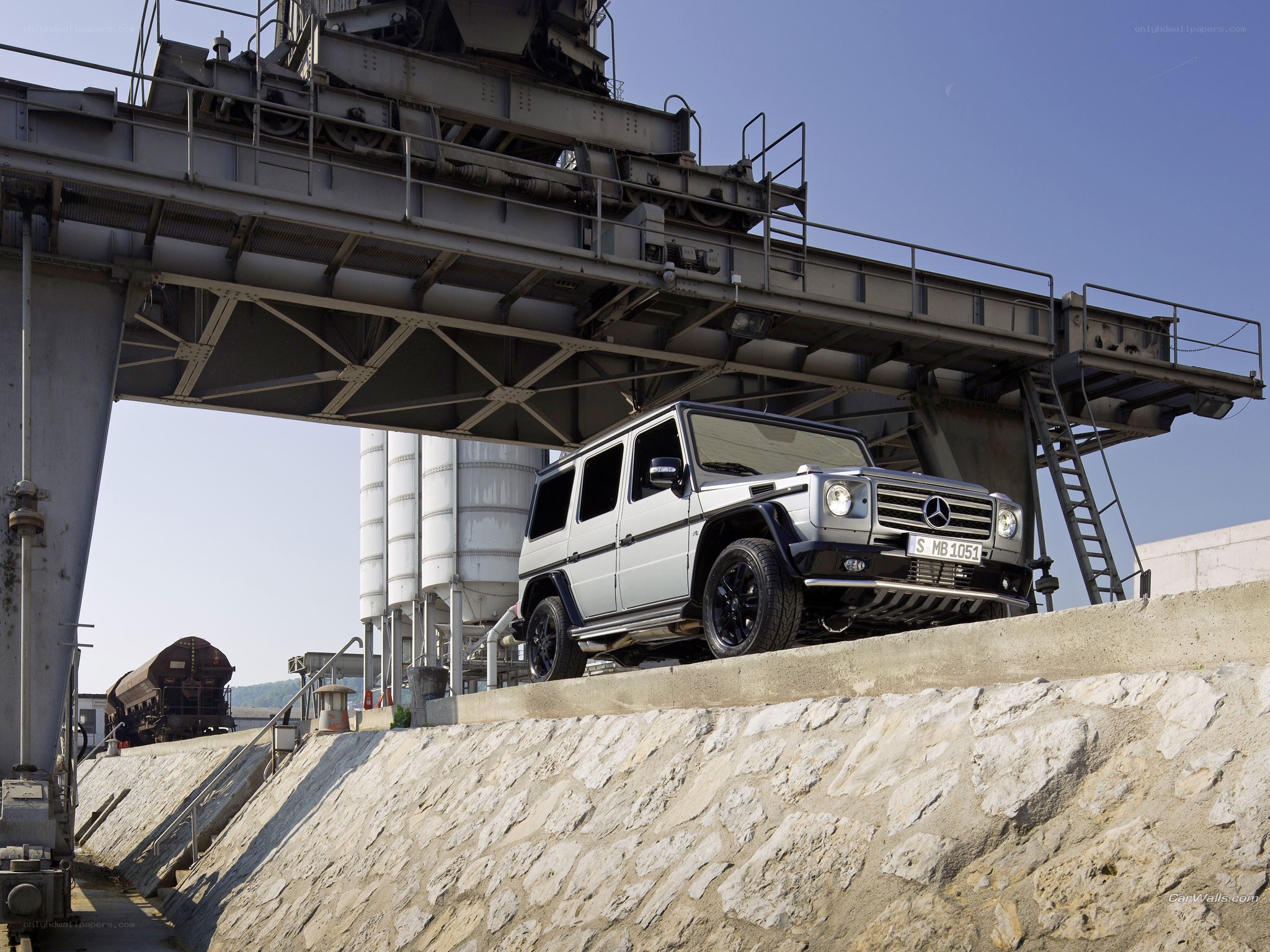 Silver G-Wagon at industrial site