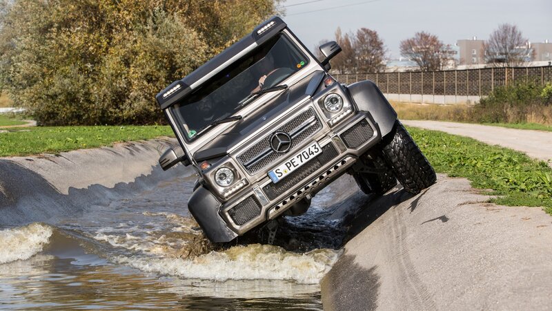 Silver G-wagon Driving — Gray