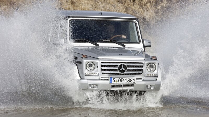 Silver G-wagon in Water — Dynamic