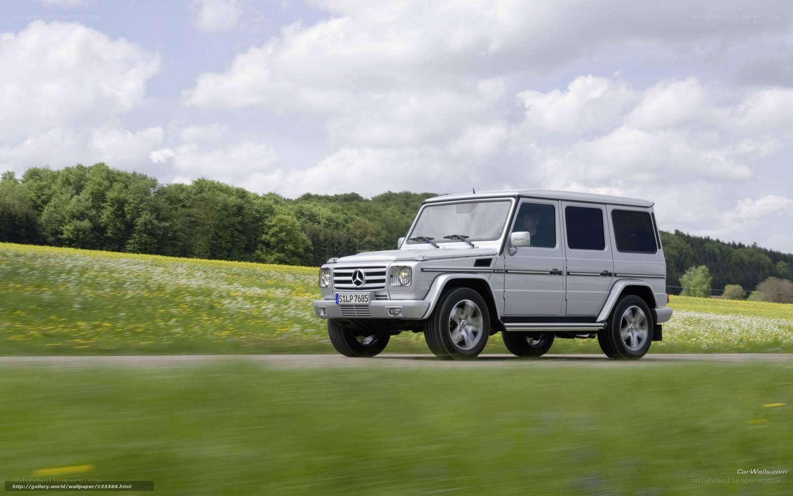 Silver G-Wagon on a country road