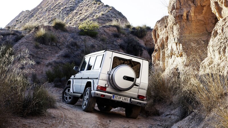 Silver G-wagon on Dirt Path