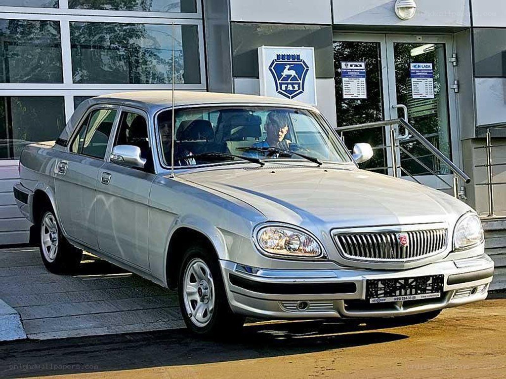 Silver GAZ sedan at dealership