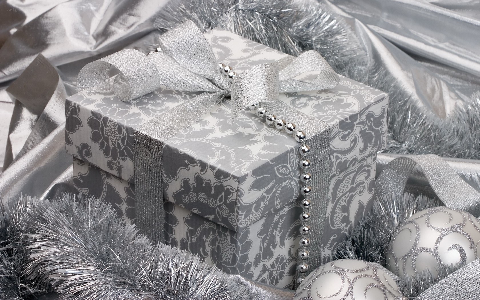 silver gift box with ornaments