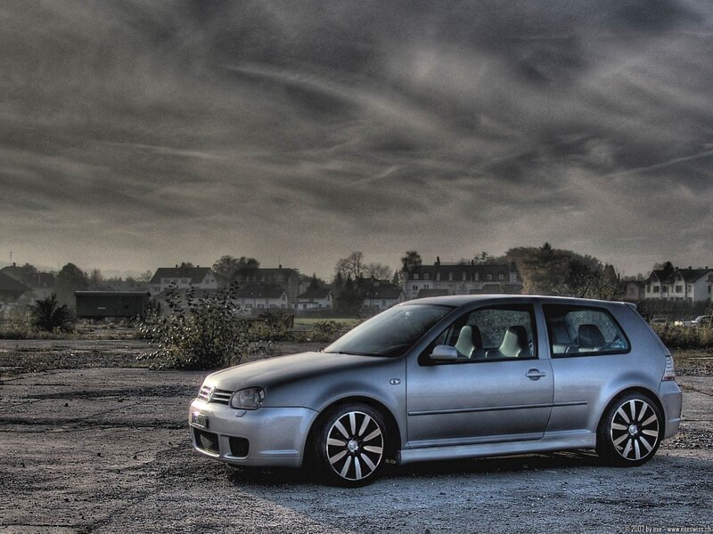 silver golf on gravel lot