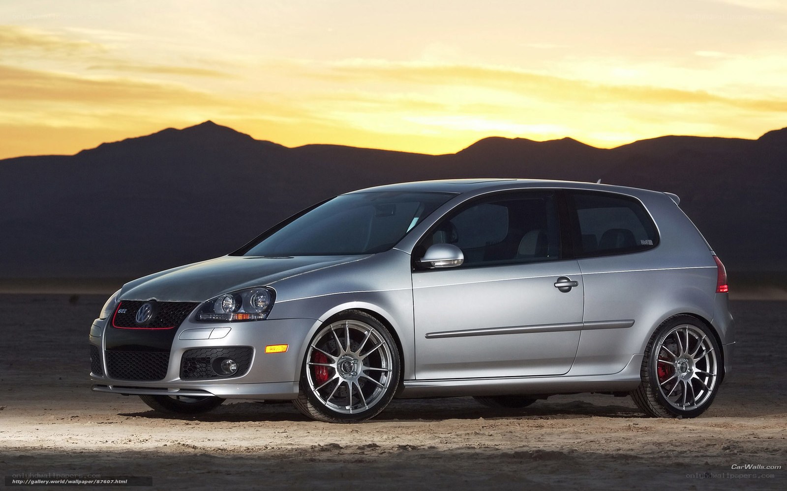 Silver GTI in desert sunset