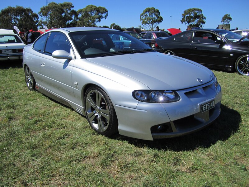 Silver GTS-41 coupe at car show