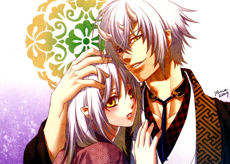Silver-haired couple in traditional attire