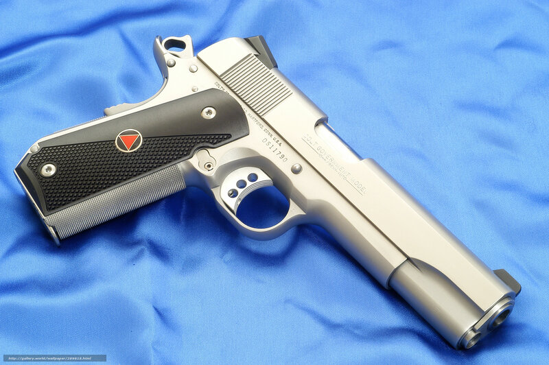 Silver Handgun on Blue Cloth — Neutral
