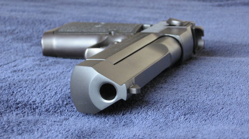 Silver Handgun on Carpet