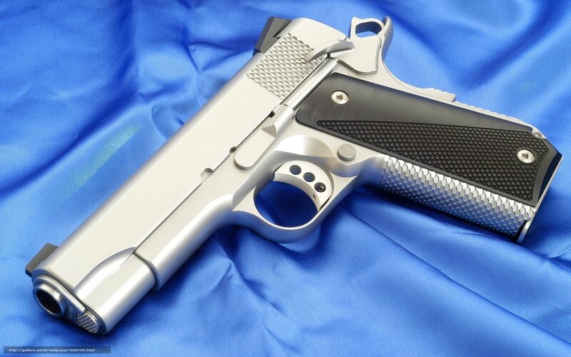 Silver Handgun on Cloth