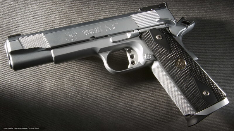 Silver Handgun on Fabric