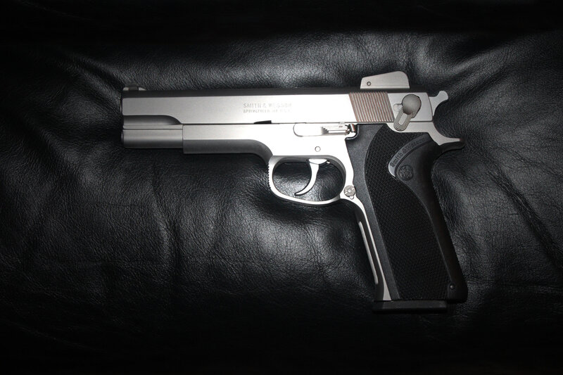 Silver Handgun on Leather