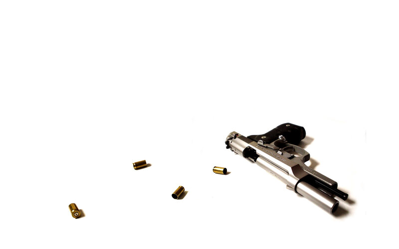 Silver Handgun with Shells — Dramatic