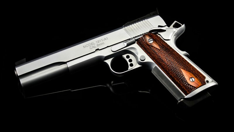 Silver Handgun with Wood Grips