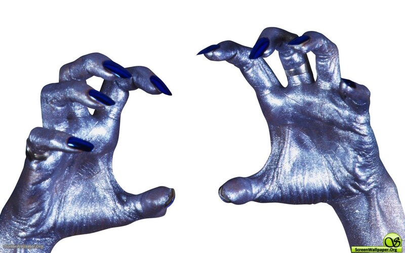 silver hands with blue nails