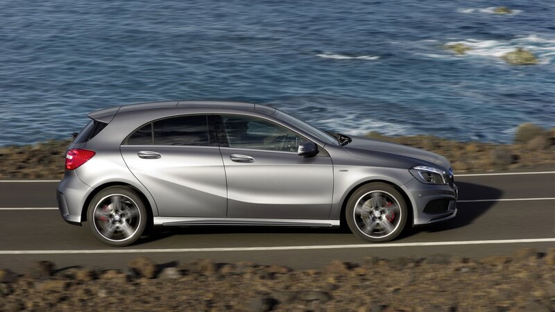 Silver Hatchback Car — Dynamic, Afternoon, Photograph, Road, Ocean