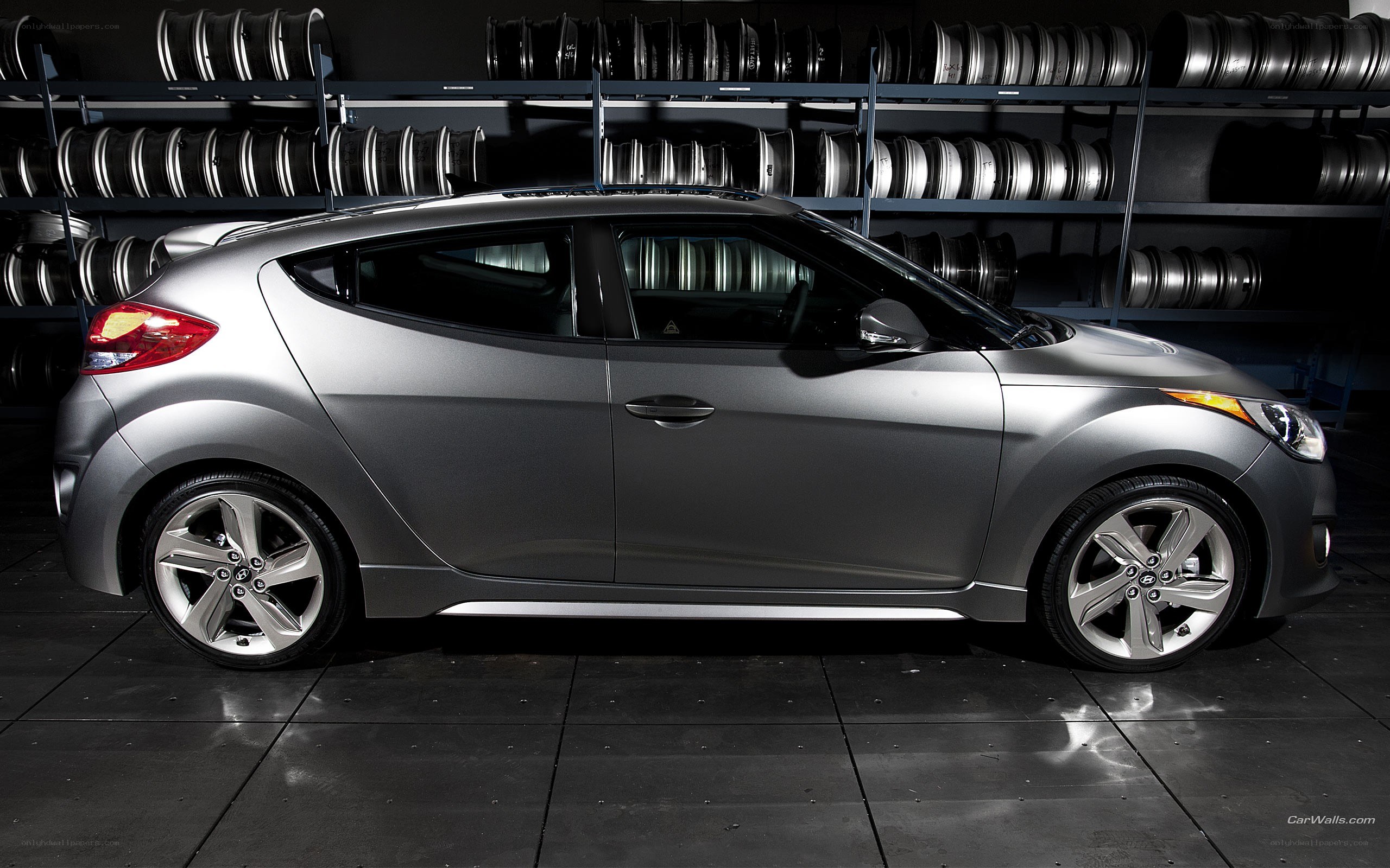 silver hatchback car in garage